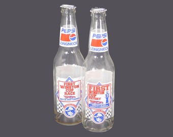 Pair of vintage Pepsi longneck Nascar bottles with caps. Richard Petty Winston Cup Race.