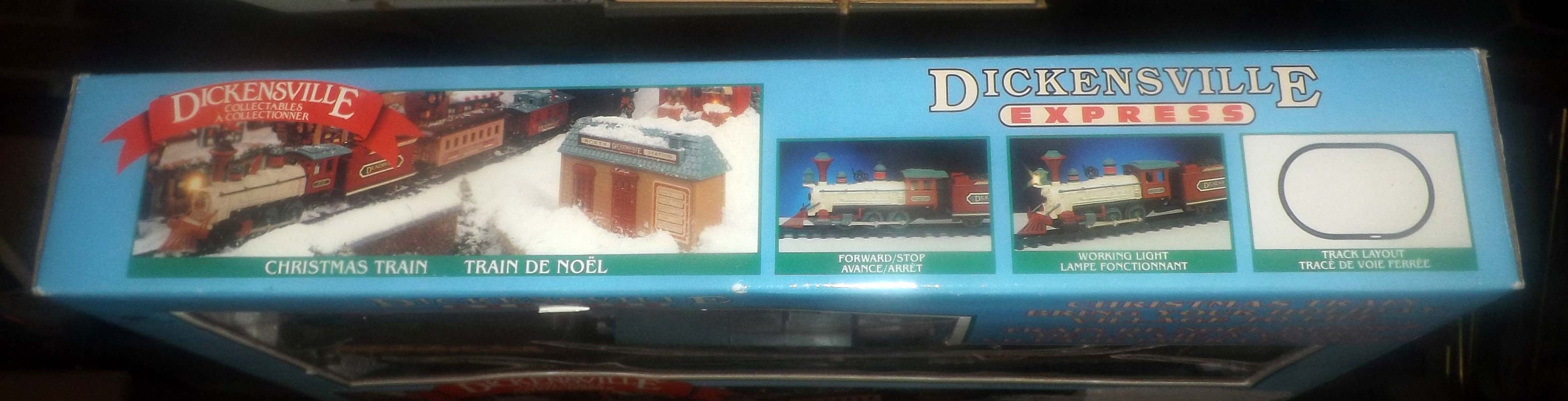 Vintage 1995 NOMA Dickensville Musical Christmas train set. Track station 4 cars working lights forward stop on cars. Complete unused