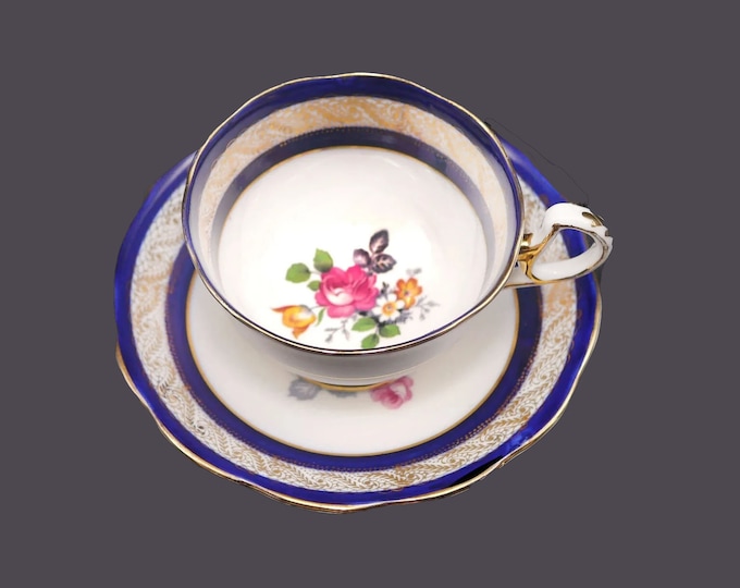 Antique Phoenix China 6902 hand-decorated cobalt and gold cup and saucer set made in England.
