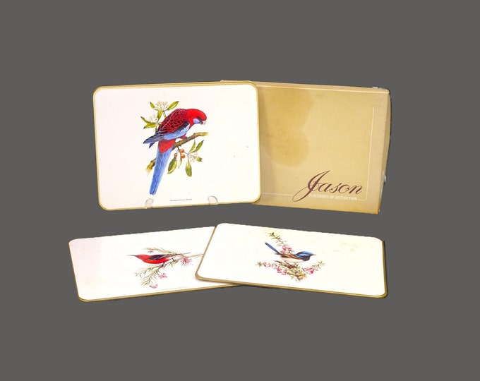 Six Birds of Oceania placemats with original box. Made in New Zealand by Jason. Acrylic with cork backs.