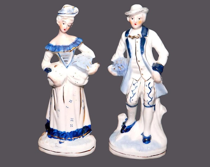 Pair of Dresden-like Courting Couple figurines. Man and woman in period Victorian dress. Attributed Taiwan early 1950s.