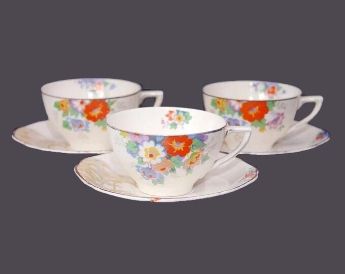 Three Hollinshead & Kirkham | HK Tunstall Montrose cup and saucer sets made in England. Flaw (see below).