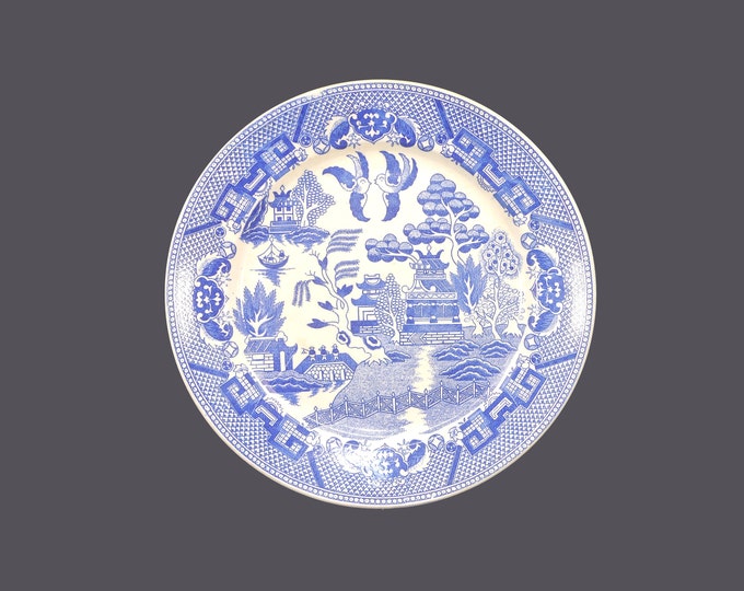 Blue Willow luncheon plate made in Japan. Classic blue-and-white Chinoiserie. Sold individually.