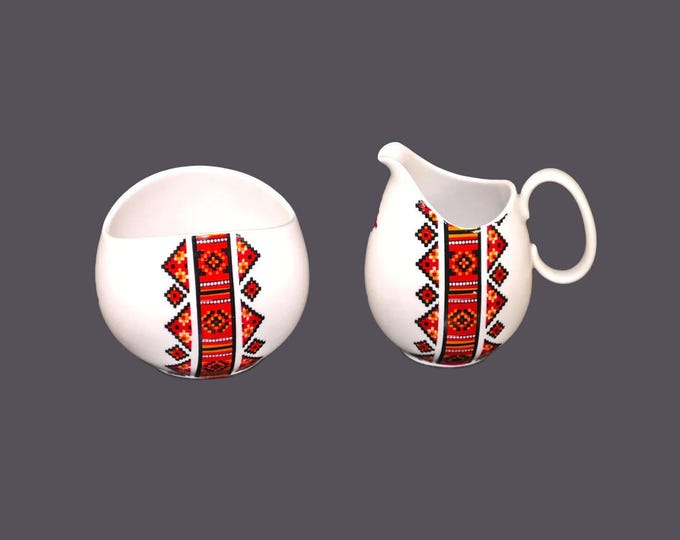 Rosenthal Raymond Loewy designed creamer and open sugar bowl set. Black, orange, yellow traditional Ukranian motif made in Germany.