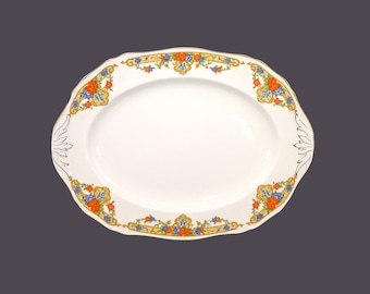Early art-deco era Alfred Meakin Montcalm | MEA380 lugged sandwich or bread platter made in England.