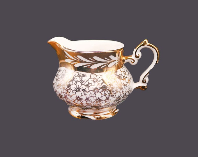 Gibsons W989 hand-decorated, gold lusterware creamer jug made in England.