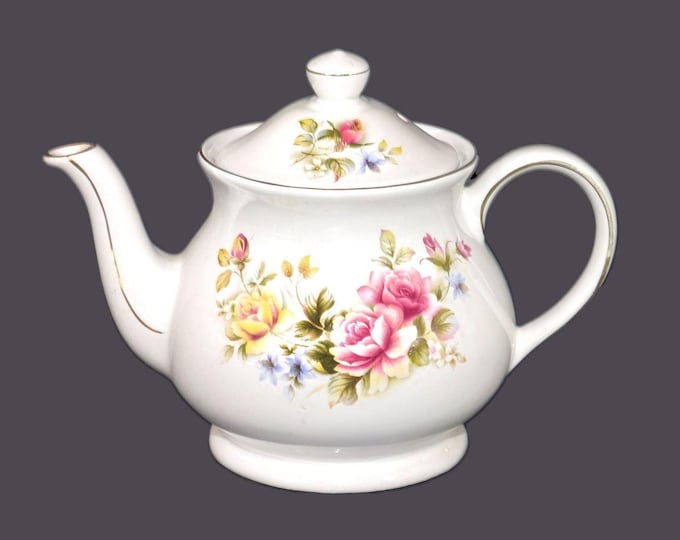 Sadler four-cup teapot with gold edge and accents. Pink and yellow roses. Made in England.
