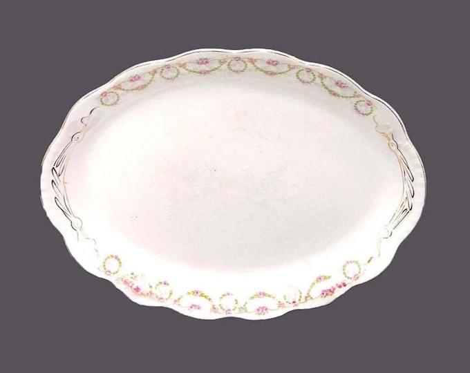 Antique Johnson Brothers JB313 oval platter made in England. Pink rose swags.
