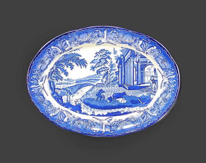 Blue-and-white large oval turkey platter made in Japan. Fisherman with dogs.