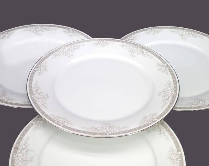 Four Noritake Windham 3194 large dinner plates. Flaw (see below).