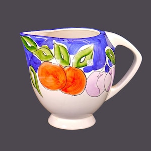 Tabletops Unlimited Tutti Frutti 48-ounce kool-aid, iced tea, lemonade pitcher. Flaws (see below).