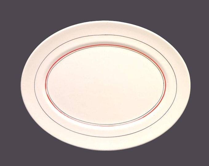 Art-deco era Myott 2196B oval meat platter made in England. Red and black bands.