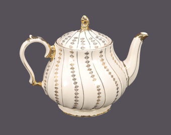 Vintage Sadler 3403 teapot made in England. Gold florals. Flaws.