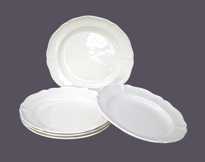Five Wedgwood Queen's Plain off-white salad plates. Wedgwood Queen's Ware made in England. Flaws (see below).