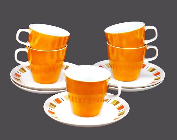 Five mismatched Mikasa Persimmon cups Mikasa Harmony saucers made in Japan.