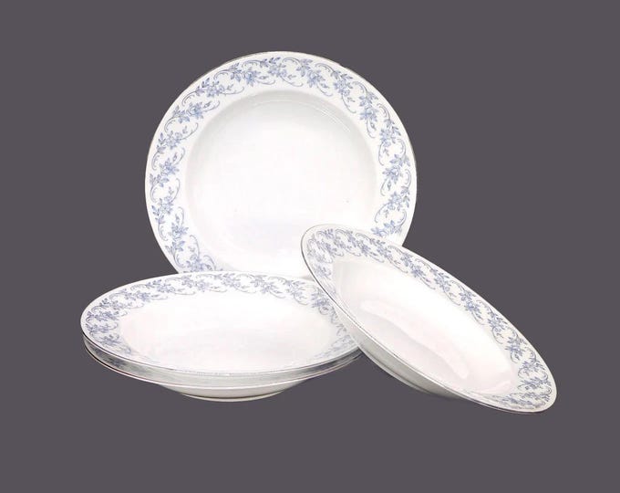 Four Johann Haviland Blue Danube rimmed soup bowls made in Bavaria.