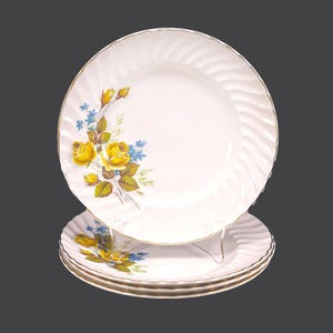 Four Ridgway Favourite Rose dinner plates made in England.