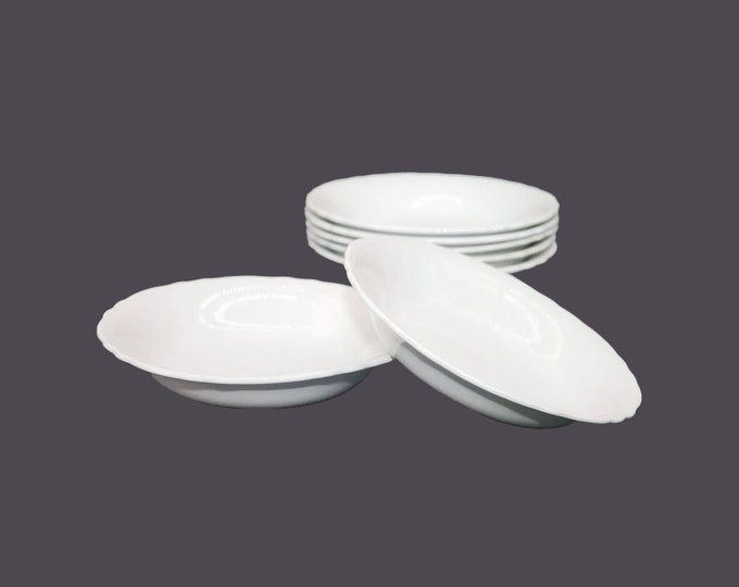 Seven Barker Bros Royal Tudor Ware all-white soup bowls embossed details made in England.