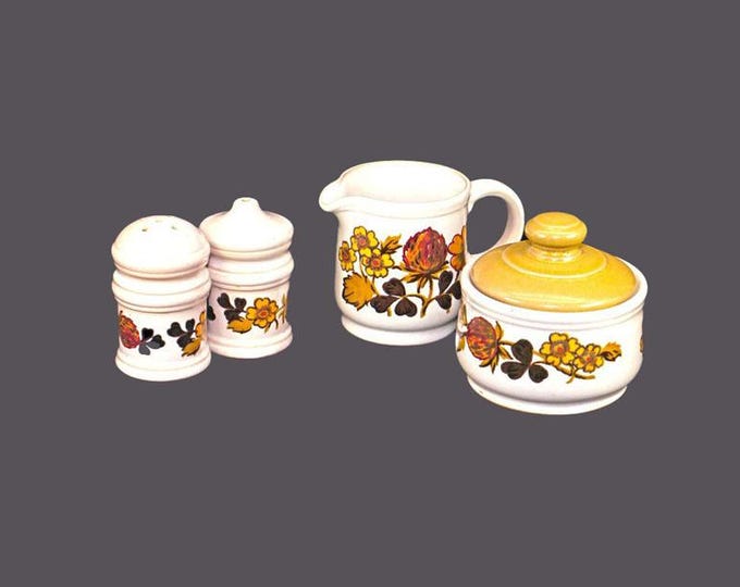 Sadler Clover stoneware creamer, covered sugar bowl and salt and pepper shaker set made in England.