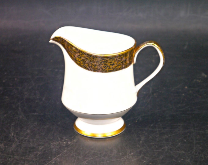 Sango Hampton 3758 creamer jug made in Japan. Black with encrusted gold.