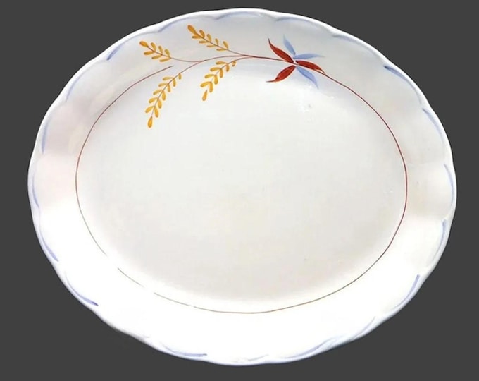 Vintage Grindley GRI207 oval platter. Creampetal ironstone made in England.