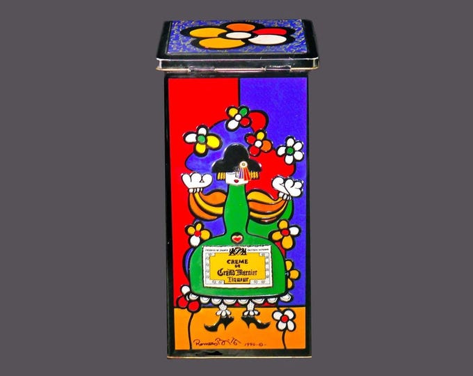 Romero Britto lithographed Creme de Grand Marnier tin signed by the artist. Flaw (see below). Gift for him. Gift for dad.