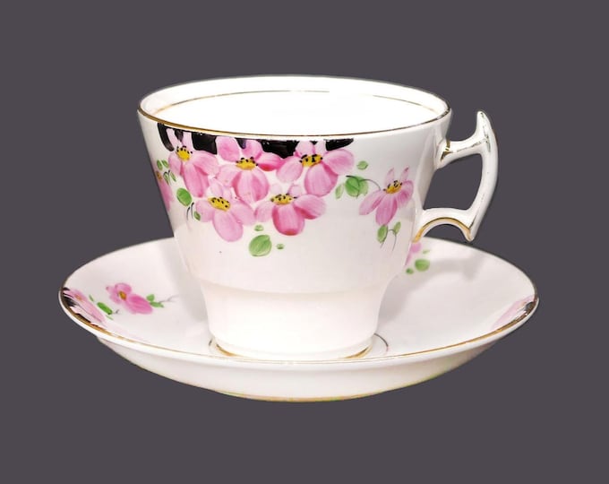 Art-deco era Phoenix Bone China 636 hand-decorated cup and saucer set. Bone china made in England. Flaw (see below).