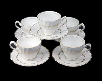 Five Myott M919G St. Regis cup and saucer sets. China Lyke ironstone made in England.