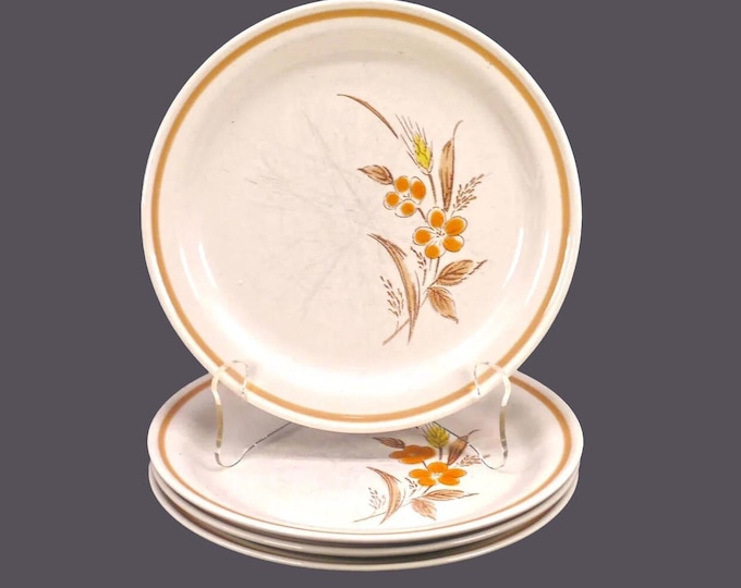 Four Imperial Stoneware Wheat salad plates made in Japan. Utensil marks (see below).