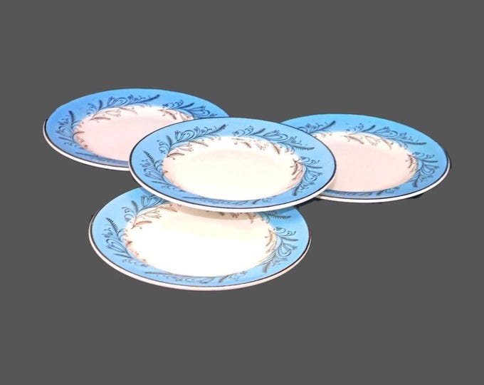 Four Washington Pottery Blue Riband bread plates made in England.