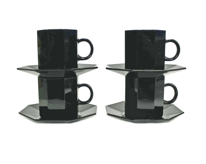 Four Arcopal Novoctime Black cup and saucer sets made in France.