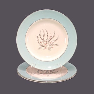 Three Homer Laughlin Triumph dinner plates. Cavalier Eggshell made in USA.
