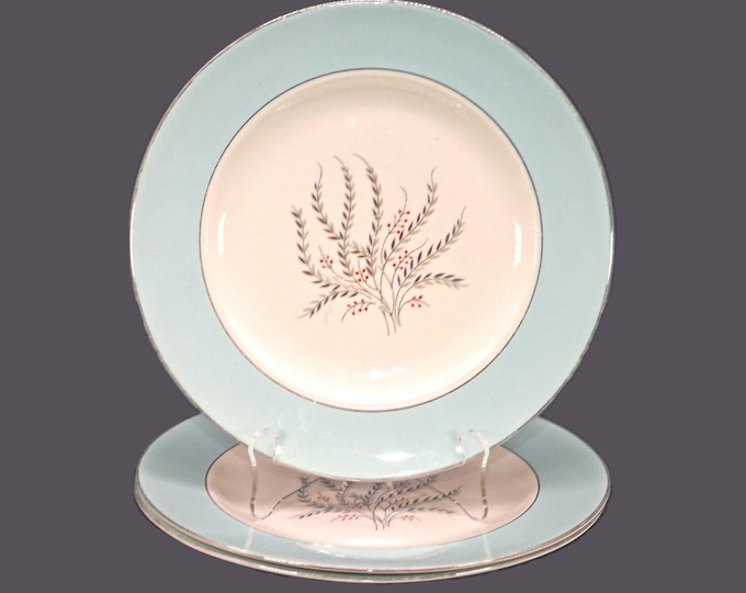 Three Homer Laughlin Triumph dinner plates. Cavalier Eggshell made in USA.