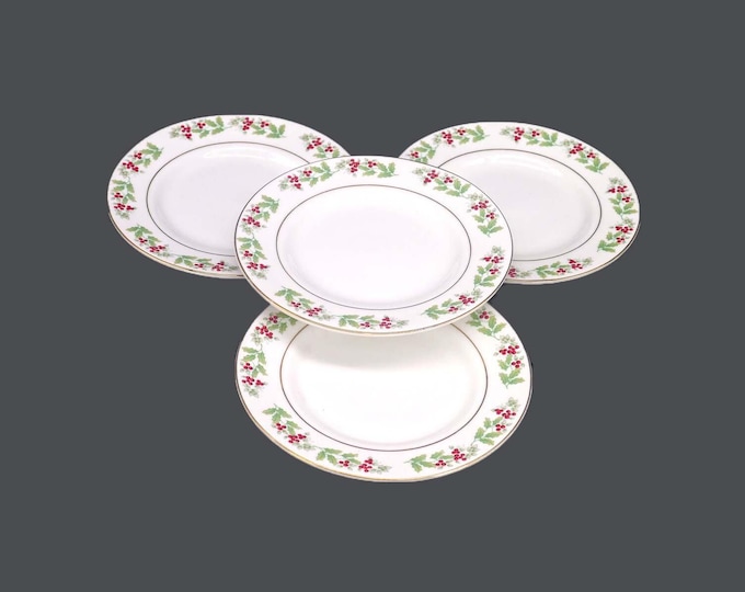 Four Gibson Housewares Christmas Harmony bread plates.
