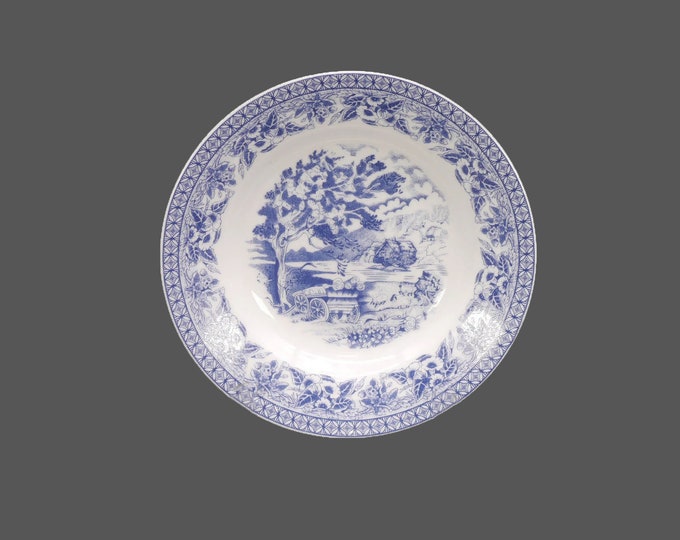 Royal Heritage Country Cottage blue-and-white toile rimmed soup bowl.