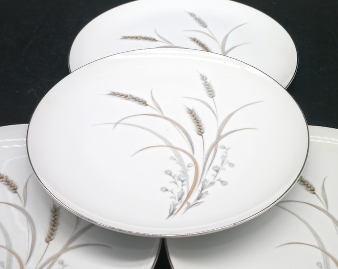 Four Mikasa Sentinel large dinner plates made in Japan.