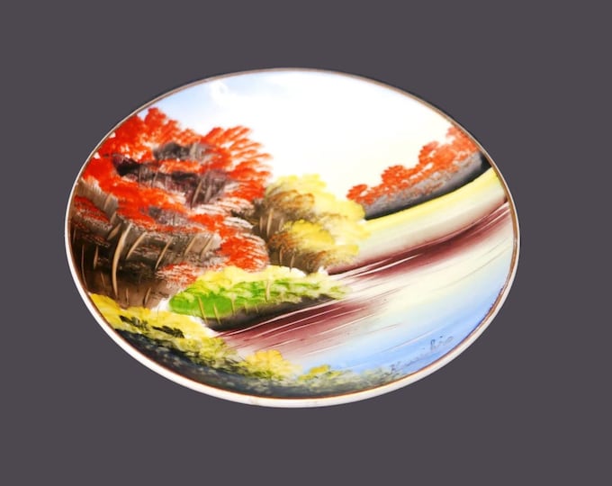 Hand-painted Nippon plate. Japanese landscape, gold edge. Signed by the artist Kuriki.