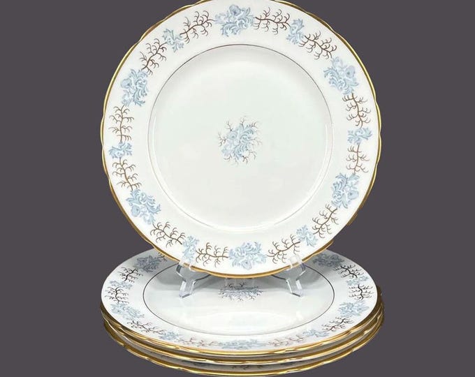 Four Tuscan China Avondale F163 dinner plates. Bone china made in England. Gold verge.