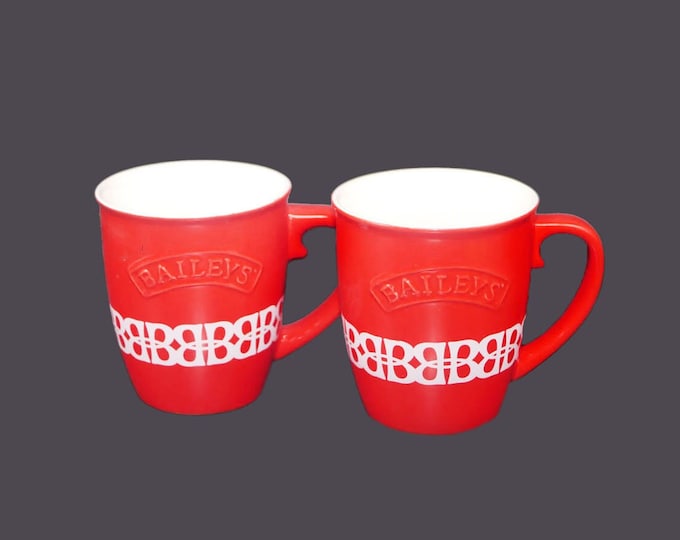 Bailey's Irish Cream red stoneware mugs with raised Bailey's wording. Sold as a pair or individually.