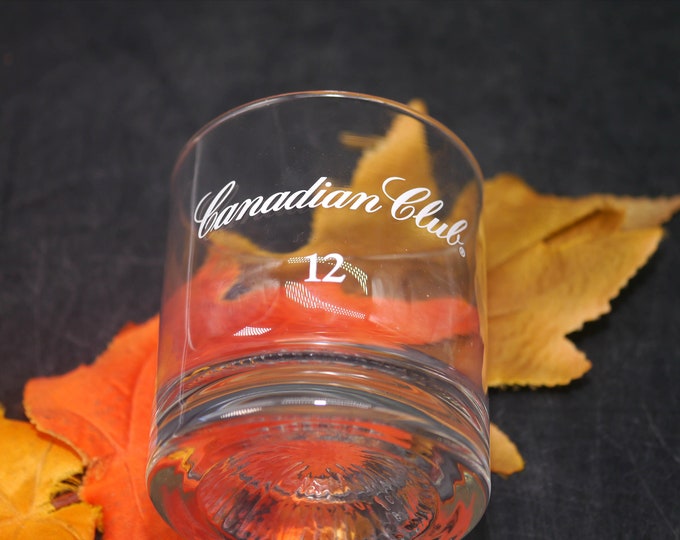 Canadian Club Aged 12 years Canadian whisky | on-the-rocks | lo-ball glass.  Etched-glass branding, weighted base.