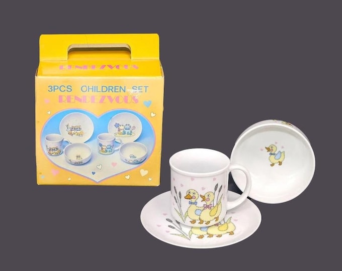 Shibata Rendezvous RE-3 children's dinner set of cup, plate and bowl made in Japan. Ducks with bows. Unused, open box.