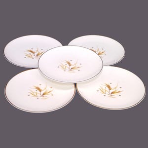 Five Royal Doulton Golden Maize H4934 bread plates made in England.