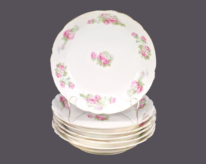 Six Carlsbad China coupe soup bowls. Pink roses, white daisies. Similar to Carlsbad 1244. Flaws (see below).