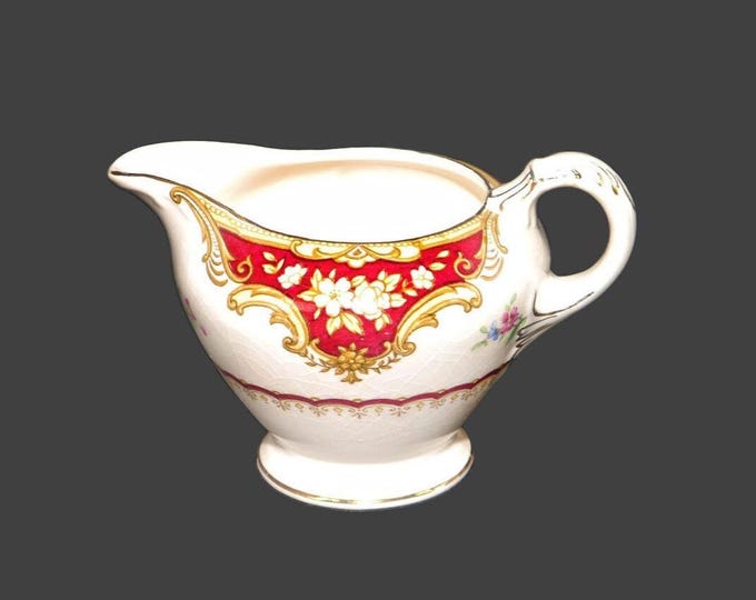 Vintage Empire Porcelain Co York Maroon creamer jug made in England.