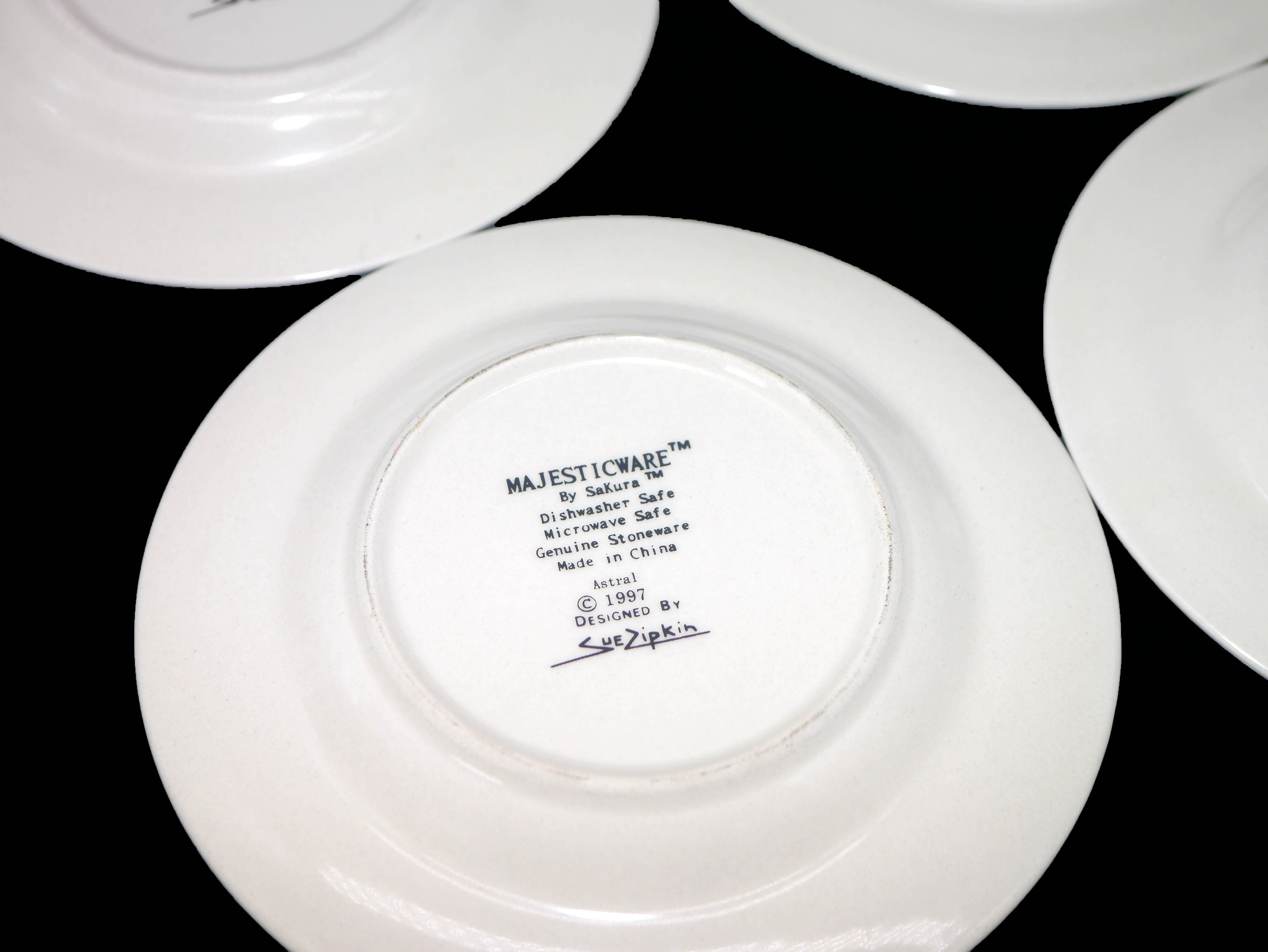 Set of Sakura Astral stoneware bread plates. Majesticware stoneware