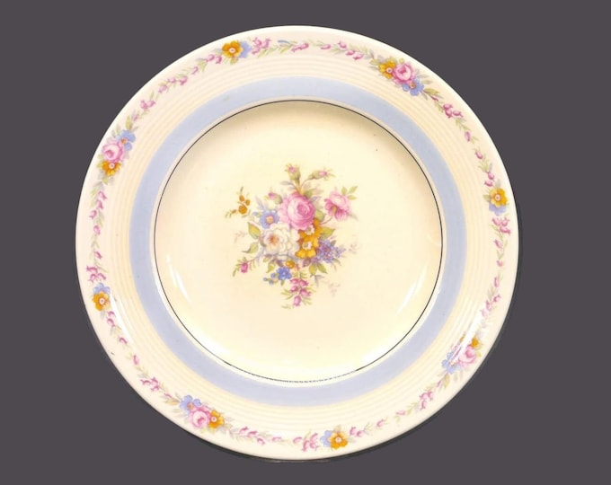 Wood & Sons salad plate. Wood's Ivory Ware made in England. Central bouquet with roses, light blue verge. Sold individually.