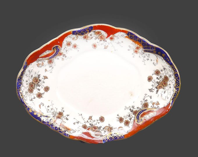 Antique Victorian-era Royal Doulton Richmond oval Imari-style gravy boat underplate made in England. Minor flaws (see below).