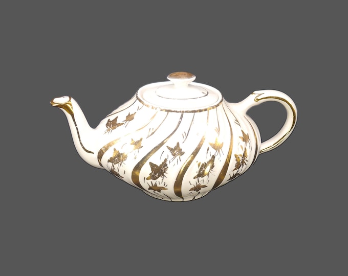 Arthur Wood 4833 four-cup, Aladdin-style teapot made in England. Gold swirls and leaves.