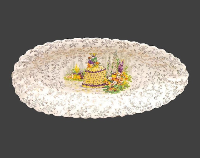 James Kent | Old Foley Crinoline Lady 3087 lenticular cranberry or relish dish made in England. Flaws (see below).