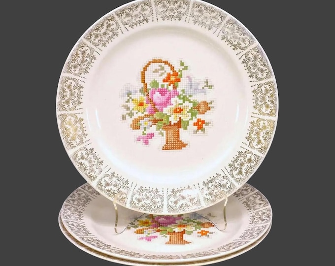 Three Salem China SLM430 dinner plates. Central cross-stitch flowers in basket made in USA.